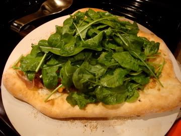 Pizza Topped with Arugula