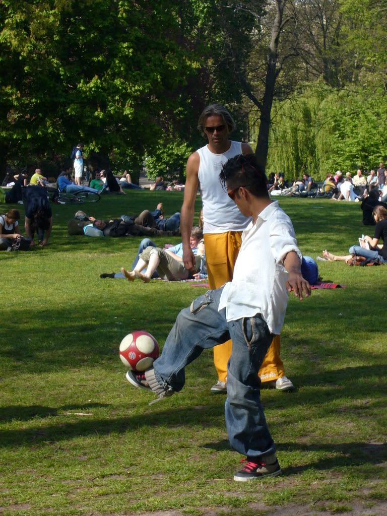 holding the ball high